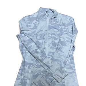 Lululemon define jacket.   Gray/white/light blue.